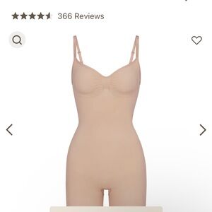 SKIMS sculpting bodysuit, mid-thigh, small.